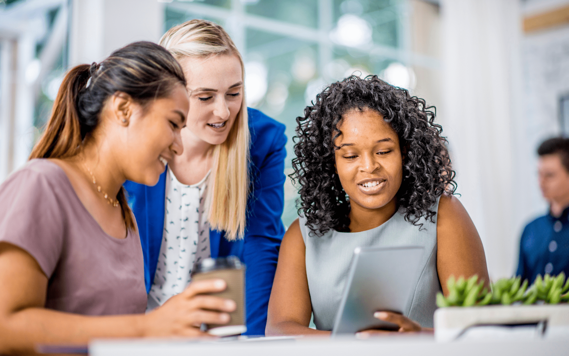 women around table for group program